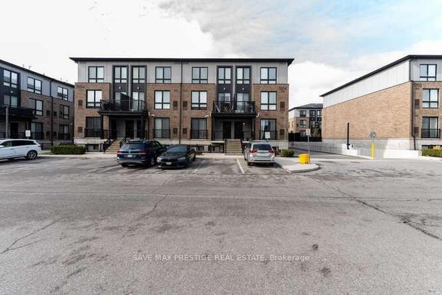 101 - 1204 Main St E, Townhouse with 2 bedrooms, 3 bathrooms and 1 parking in Milton ON | Image 1