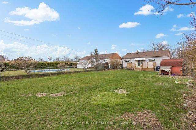 21 Buena Vista Ave, House detached with 3 bedrooms, 2 bathrooms and 4 parking in Toronto ON | Image 32