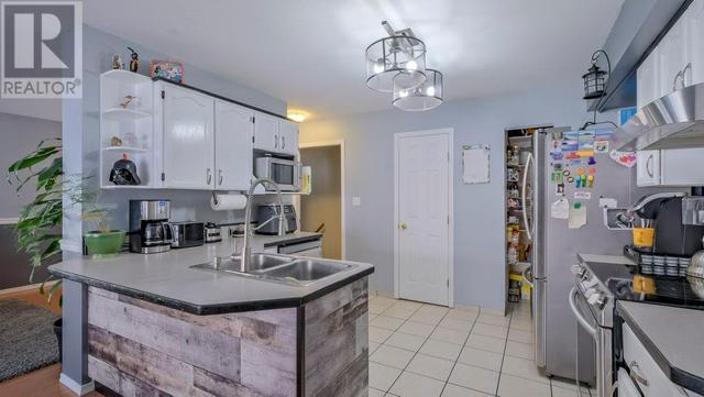 158 - 1458 Penticton Avenue, House attached with 3 bedrooms, 1 bathrooms and 2 parking in Penticton BC | Image 10