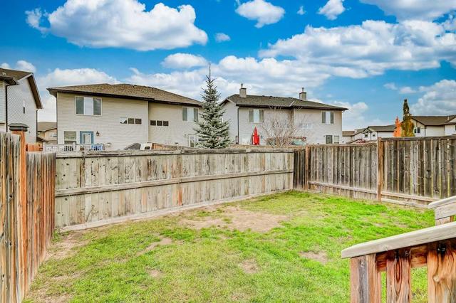 706 Luxstone Gate Sw, Home with 3 bedrooms, 2 bathrooms and 2 parking in Airdrie AB | Image 26