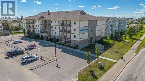 407, - 10521 84, Home with 1 bedrooms, 1 bathrooms and null parking in Grande Prairie AB | Card Image