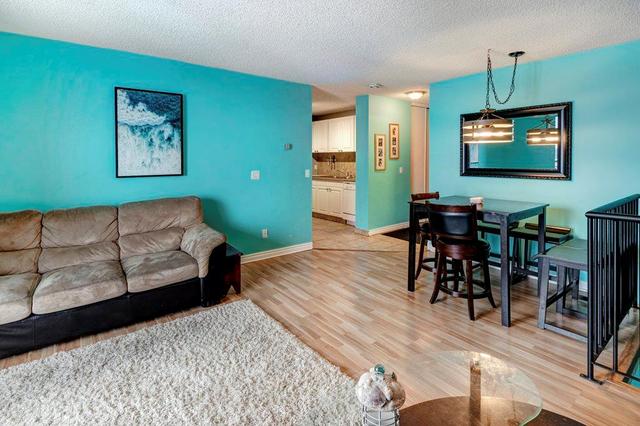 1203 - 4944 Dalton Drive Nw, Condo with 2 bedrooms, 1 bathrooms and 1 parking in Calgary AB | Image 1