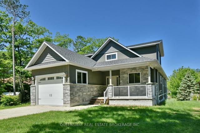 1852 River Rd W, House detached with 4 bedrooms, 4 bathrooms and 9 parking in Wasaga Beach ON | Image 1