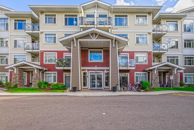 106 - 16 Auburn Bay Link Se, Condo with 2 bedrooms, 2 bathrooms and 1 parking in Calgary AB | Image 1