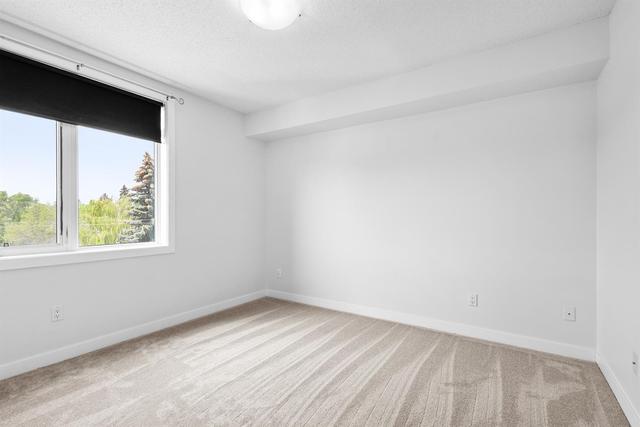 401 - 2419 Centre Street Nw, Condo with 2 bedrooms, 2 bathrooms and 1 parking in Calgary AB | Image 11