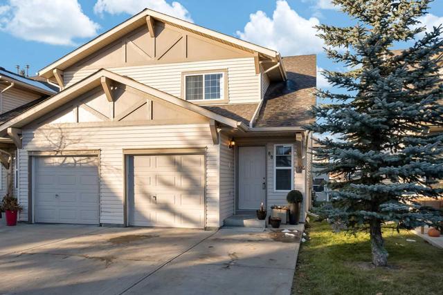 88 Eversyde Court Sw, Home with 3 bedrooms, 1 bathrooms and 3 parking in Calgary AB | Image 2