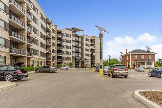 205 - 33 Whitmer St, Condo with 2 bedrooms, 2 bathrooms and 1 parking in Milton ON | Image 1