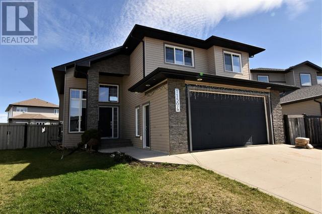 11506 72 Avenue, House detached with 4 bedrooms, 3 bathrooms and 4 parking in Grande Prairie AB | Card Image