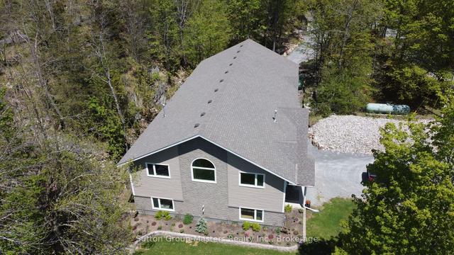 5058 Rock Cliff Lane, House detached with 3 bedrooms, 5 bathrooms and 24 parking in South Frontenac ON | Image 2