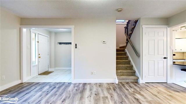 Living Room Photo - Front Foyer & Stairs to Bedroom Level | Image 4