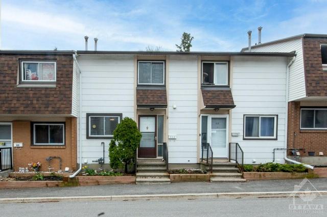 g - 52 Sumac Street, Townhouse with 3 bedrooms, 2 bathrooms and 1 parking in Ottawa ON | Image 1