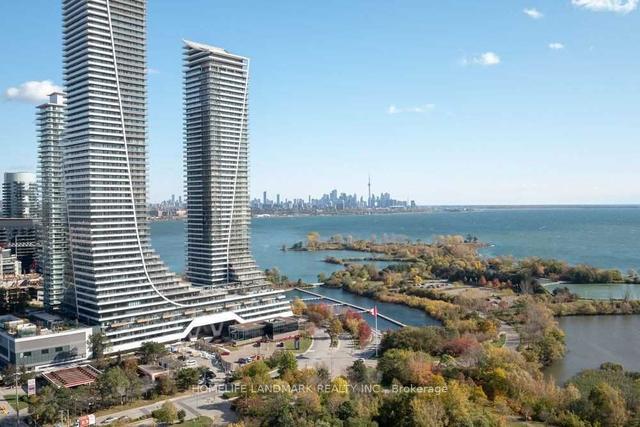 6107 - 30 Shore Breeze Dr, Condo with 2 bedrooms, 2 bathrooms and 1 parking in Toronto ON | Image 1