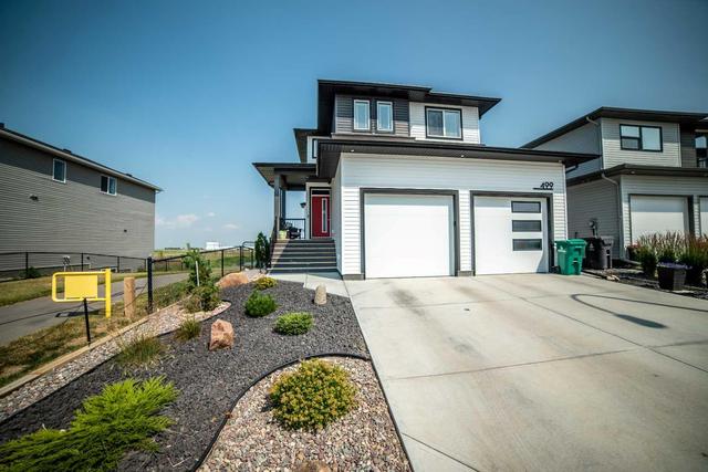499 Greywolf Cove N, House detached with 4 bedrooms, 3 bathrooms and 4 parking in Lethbridge AB | Image 1