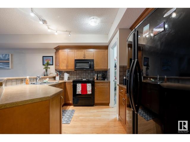 305 - 9815 96a St Nw, Condo with 1 bedrooms, 2 bathrooms and 1 parking in Edmonton AB | Image 5