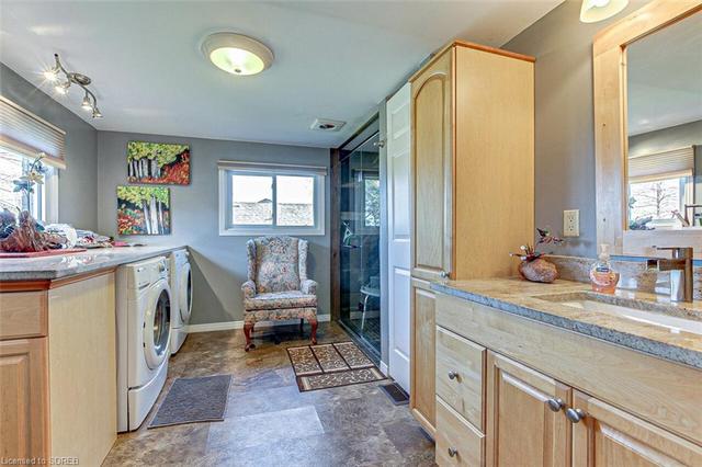 Large bathroom with washer and dryer | Image 35