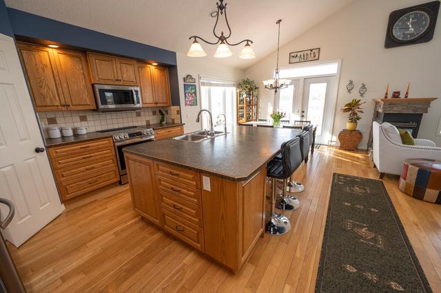 46 Estella Crescent, House detached with 4 bedrooms, 3 bathrooms and 5 parking in Lacombe AB | Image 11