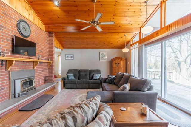 Family Room!  Lots of windows on the north side of the Family Room offer tremendous views of the backyard and Ravine! | Image 10