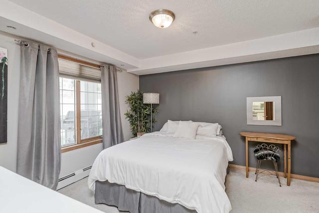 121 - 6868 Sierra Morena Boulevard Sw, Condo with 2 bedrooms, 1 bathrooms and 1 parking in Calgary AB | Image 10