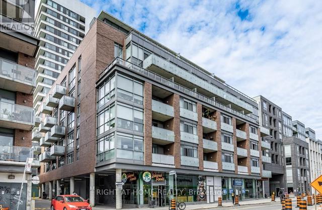 311 - 8 Gladstone Ave, Condo with 2 bedrooms, 1 bathrooms and 1 parking in Toronto ON | Image 1