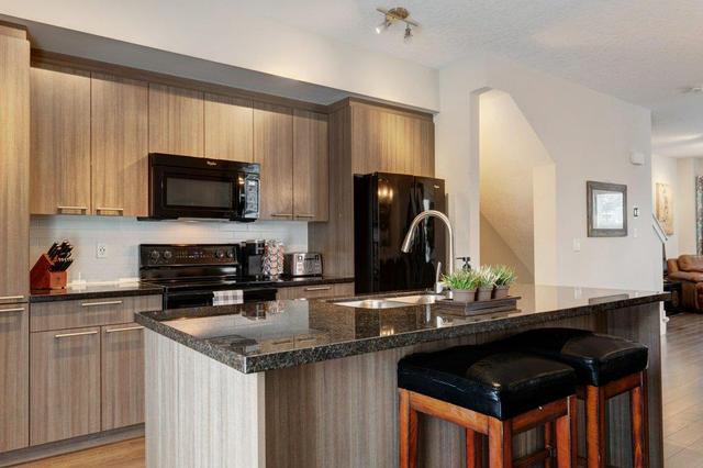 336 Silverado Common Sw, Home with 3 bedrooms, 2 bathrooms and 2 parking in Calgary AB | Image 14