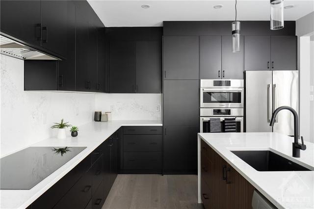 Kitchen of similar model minus appliances | Image 7