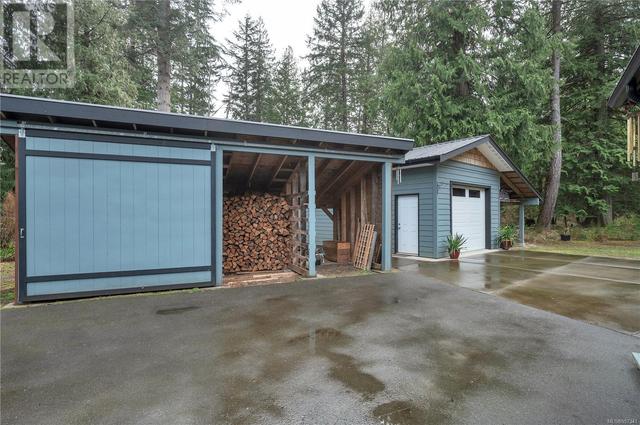 detached 10'x24' wood shed/garden shed, with sliding bay door.  16'x24' shop behind. | Image 46