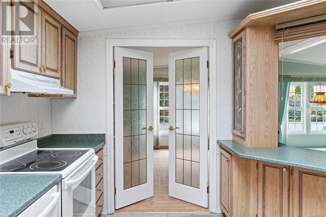 French doors open to a beautiful dining room | Image 10