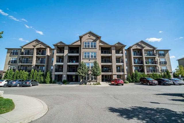 304 - 1390 Main St E, Condo with 1 bedrooms, 1 bathrooms and 1 parking in Milton ON | Image 1