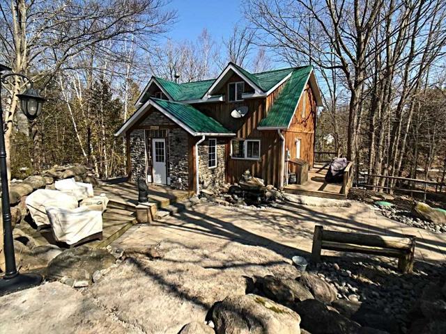421 Line 11 S, House detached with 2 bedrooms, 3 bathrooms and 13 parking in Oro Medonte ON | Image 1