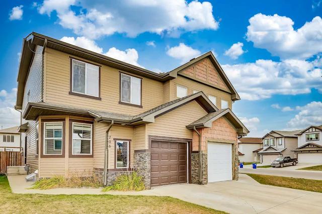 706 Luxstone Gate Sw, Home with 3 bedrooms, 2 bathrooms and 2 parking in Airdrie AB | Image 1