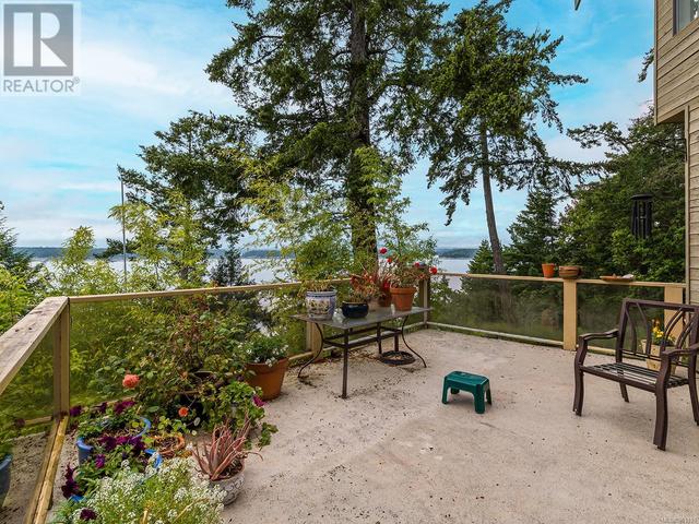 2565 Islands View Dr, House detached with 5 bedrooms, 3 bathrooms and 6 parking in Nanaimo B BC | Image 6
