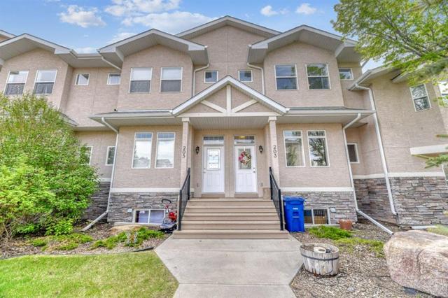 203 Strathcona Circle, House attached with 3 bedrooms, 2 bathrooms and 2 parking in Strathmore AB | Card Image