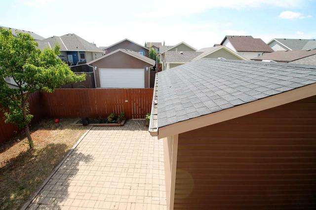 808 Mt Sundance Lane W, House detached with 4 bedrooms, 3 bathrooms and 3 parking in Lethbridge AB | Image 24