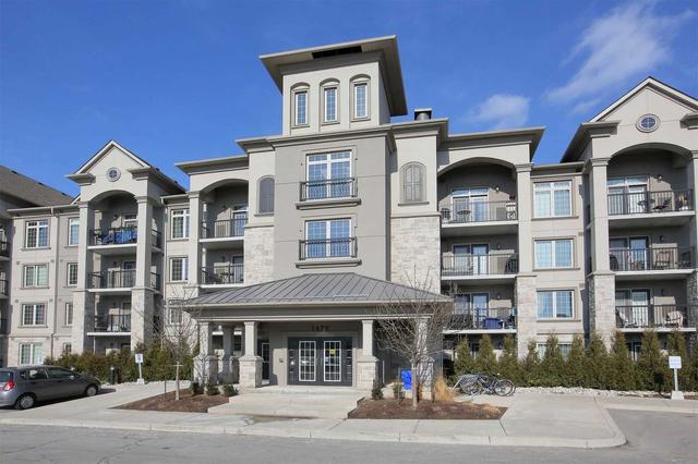 203 - 1470 Main St E, Condo with 2 bedrooms, 1 bathrooms and 2 parking in Milton ON | Image 1