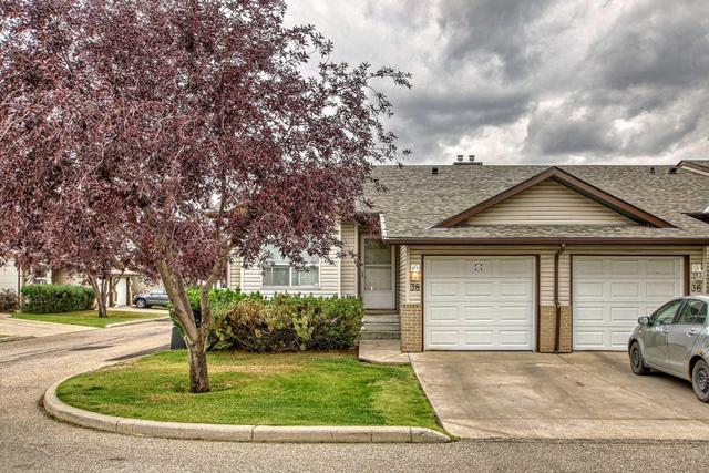 38 Tararidge Circle Ne, Home with 2 bedrooms, 2 bathrooms and 2 parking in Calgary AB | Image 2