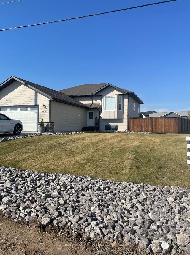 4838 Elevator Rd, House attached with 3 bedrooms, 3 bathrooms and 4 parking in Fort St. John BC | Image 12