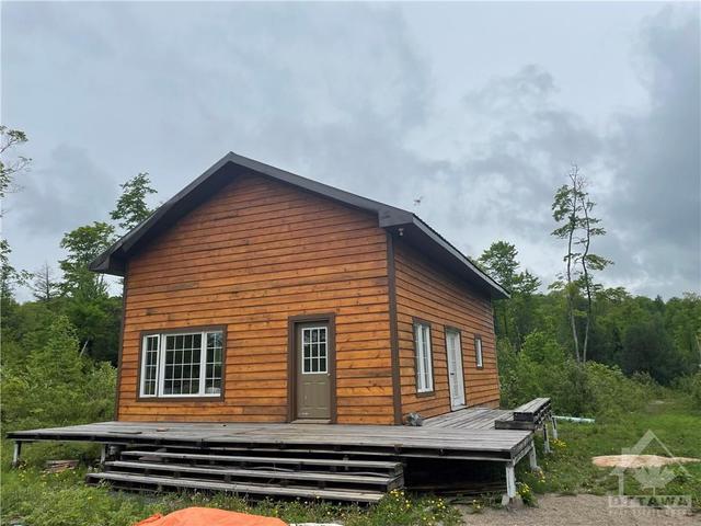 1786 Kashawakawak Lake Trail, House detached with 1 bedrooms, 1 bathrooms and 10 parking in North Frontenac ON | Image 1