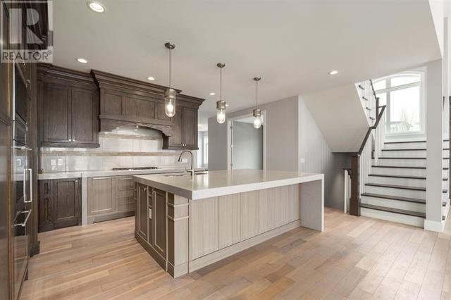 7 Aspen Summit Court Sw, House detached with 6 bedrooms, 3 bathrooms and 2 parking in Calgary AB | Image 8
