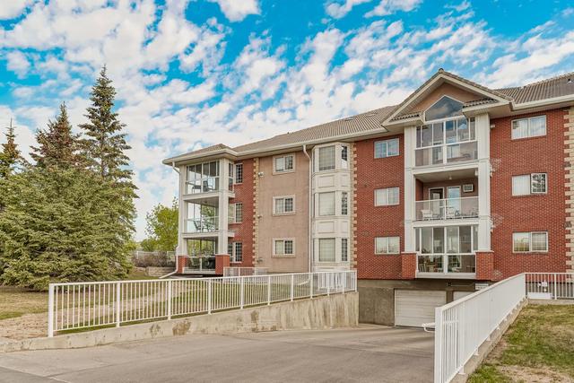 121 - 6868 Sierra Morena Boulevard Sw, Condo with 2 bedrooms, 1 bathrooms and 1 parking in Calgary AB | Image 35