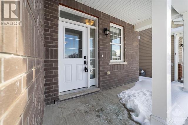 The covered front porch provides comfort & loads of curb appeal. | Image 17