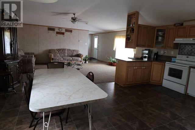 720 2 Street N, House other with 3 bedrooms, 2 bathrooms and 4 parking in Taber MD AB | Image 9