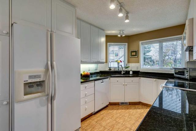133 Sienna Park Green Sw, Home with 3 bedrooms, 2 bathrooms and 4 parking in Calgary AB | Image 4