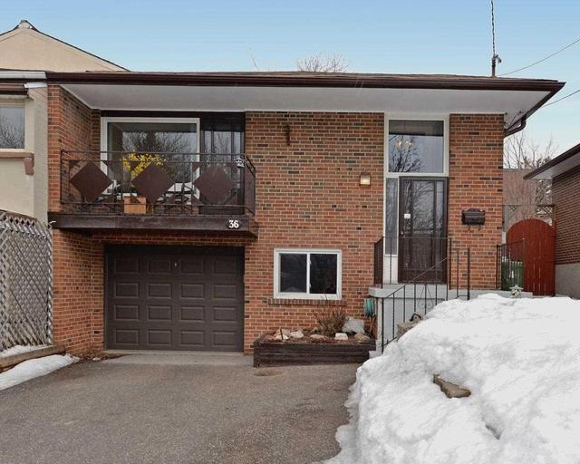 36 Canadine Rd, House semidetached with 3 bedrooms, 2 bathrooms and 3 parking in Toronto ON | Image 1