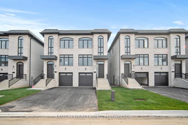 23 St. Gaspar Crt W, House semidetached with 3 bedrooms, 4 bathrooms and 2 parking in Toronto ON | Image 1
