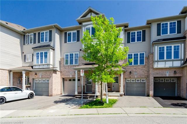 4 - 2006 Trawden Way, House attached with 3 bedrooms, 2 bathrooms and 3 parking in Oakville ON | Image 1