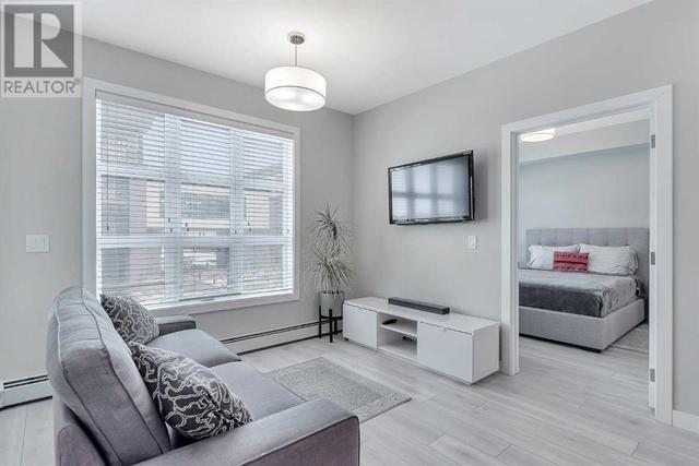 205, - 383 Smith Street Nw, Condo with 2 bedrooms, 2 bathrooms and 1 parking in Calgary AB | Image 10