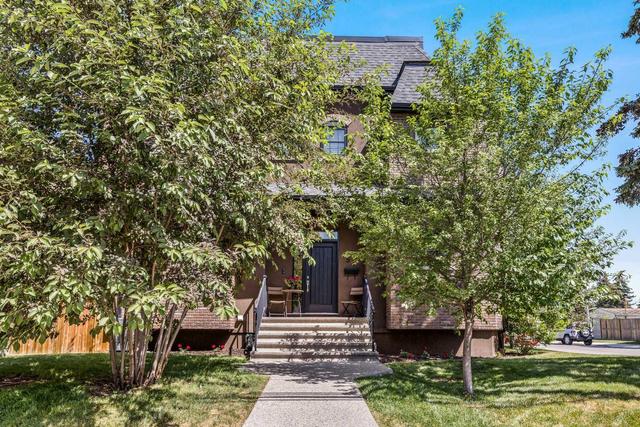 54 34 Avenue Sw, Home with 4 bedrooms, 3 bathrooms and 2 parking in Calgary AB | Image 1