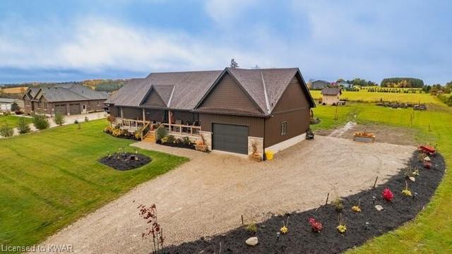 8008 Concession 12, House detached with 3 bedrooms, 3 bathrooms and 14 parking in Mapleton ON | Image 1
