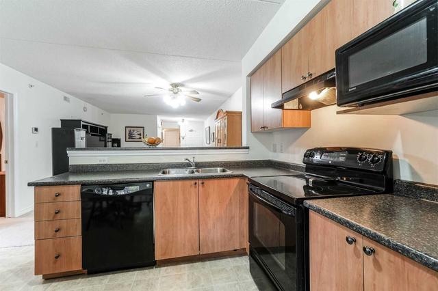111 - 1380 Main St E, Condo with 3 bedrooms, 2 bathrooms and 1 parking in Milton ON | Image 16