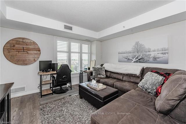 410 - 108 Summit Ridge Dr, Condo with 1 bedrooms, 1 bathrooms and 2 parking in Guelph ON | Image 6